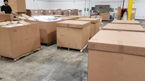 Industrial warehouse shelves storing bulk amla fruit powder inventory