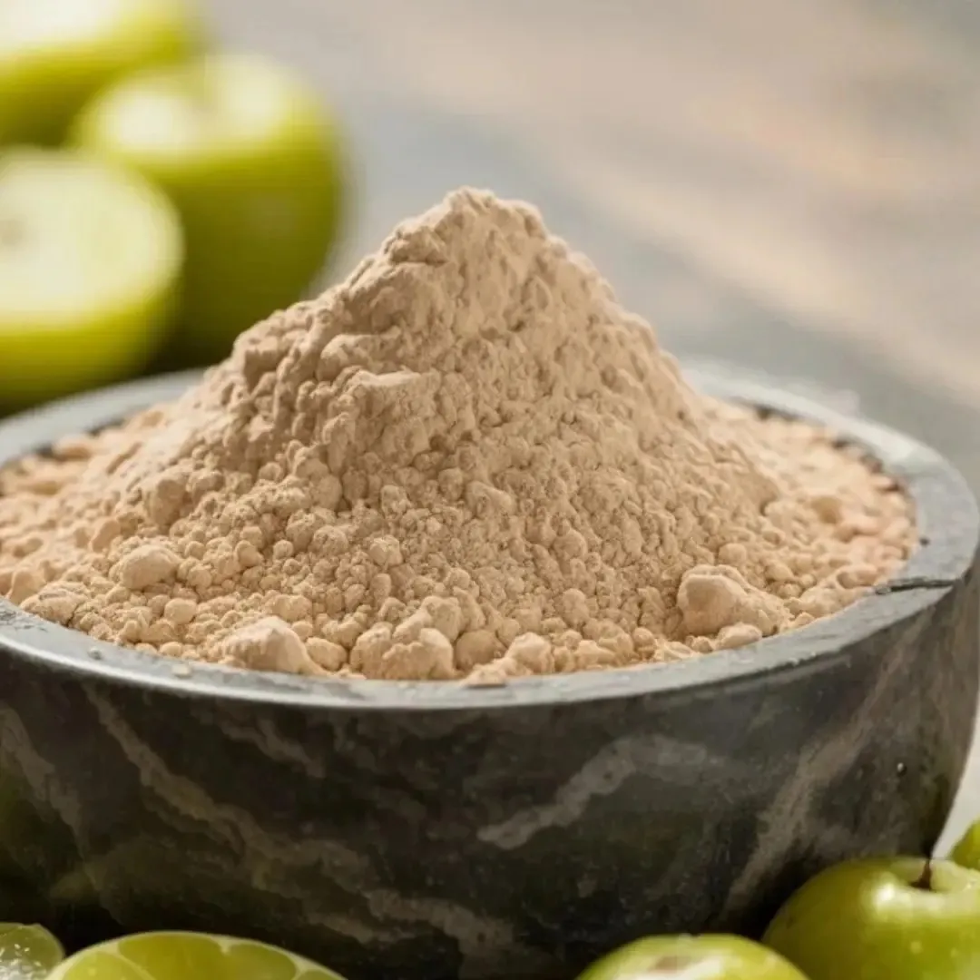 Organic amla fruit powder ingredient close-up showing fine powder texture