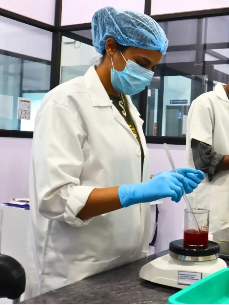 Food scientists in production facility